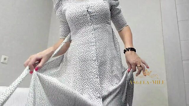 Busty MILF Angela Shakes Massive Tits and Waves Panties in Steamy Striptease