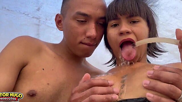 Hot babe soaking wet hosing her tight body down in the yard while twerking to funky beats