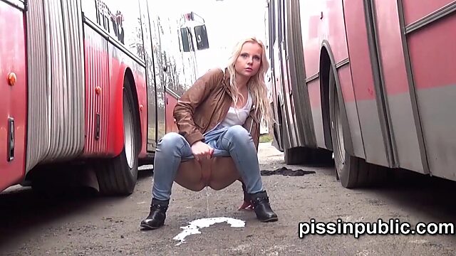 Girls squirt in public between parked cars