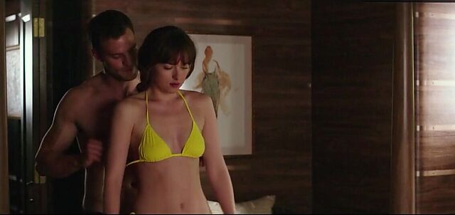 Dakota Johnson's juicy boobs bust out of bikini in Fifty Shades Freed beach scene