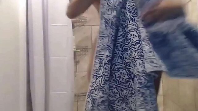 Sexy Arab with huge tits shows off in the shower