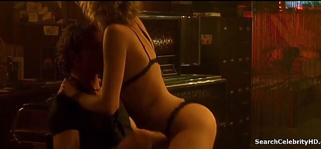 Rebecca Romijn's Sultry Seduction in Femme Fatale